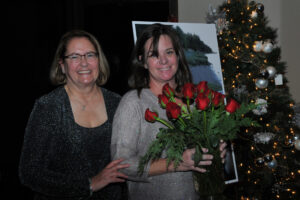 Woman of the Year Sara Rolfs, right, with Women's Resource Center board member Tracy Kasnic